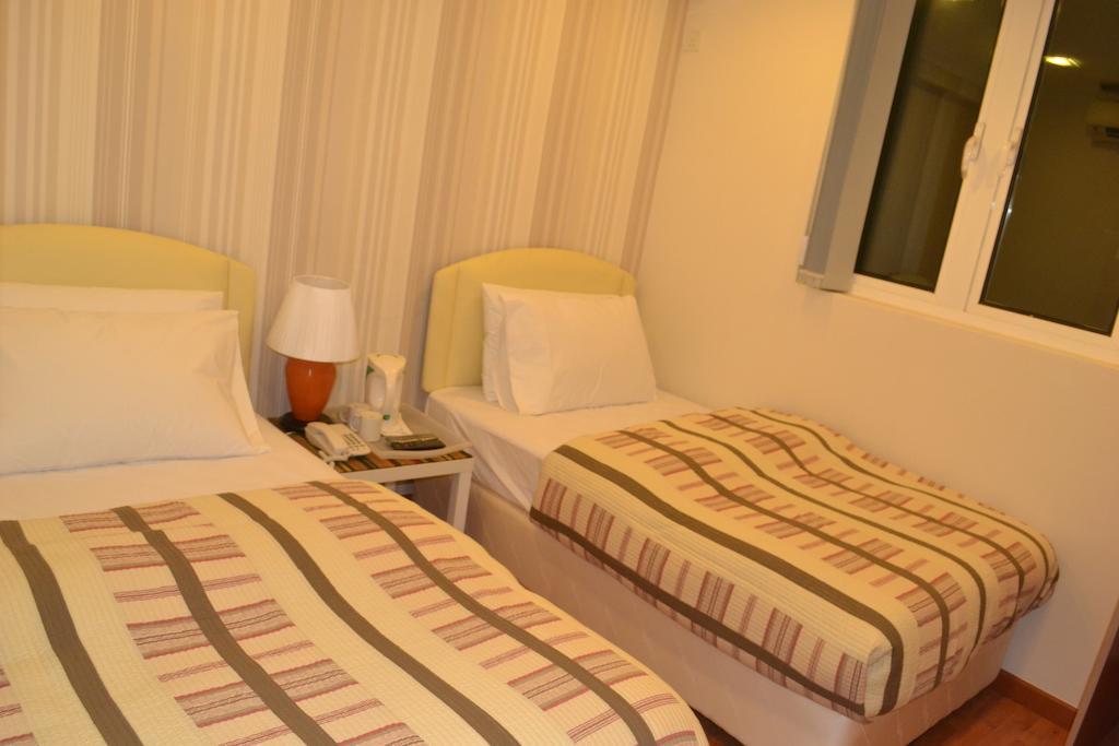 Golden Suites Hotel Куала-Лумпур Номер фото
