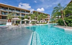 Отель Wyndham Grand Nai Harn Beach Phuket Exterior photo