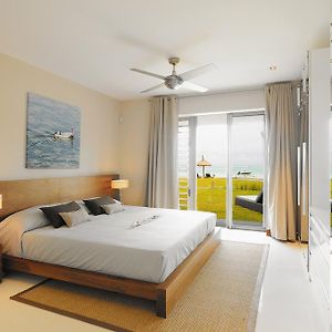 Coin De Paradis Luxury Beachfront Apartment Пуэнт-д'Эсни Room photo