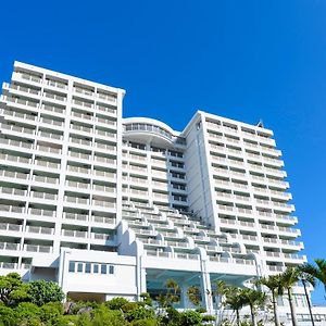 Отель Kanehide Onna Marine View Palace Exterior photo